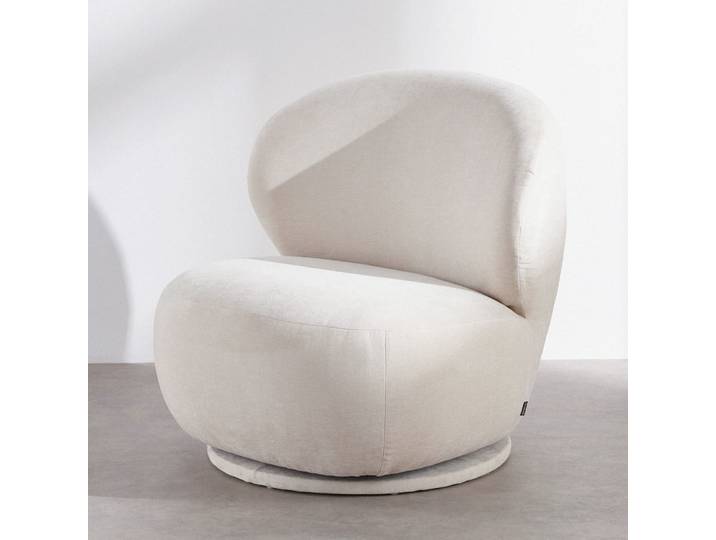 Fauteuil pivotant en velours beige crème