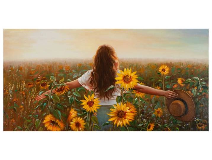 Bild Frau im Sonnenblumenfeld image LAND