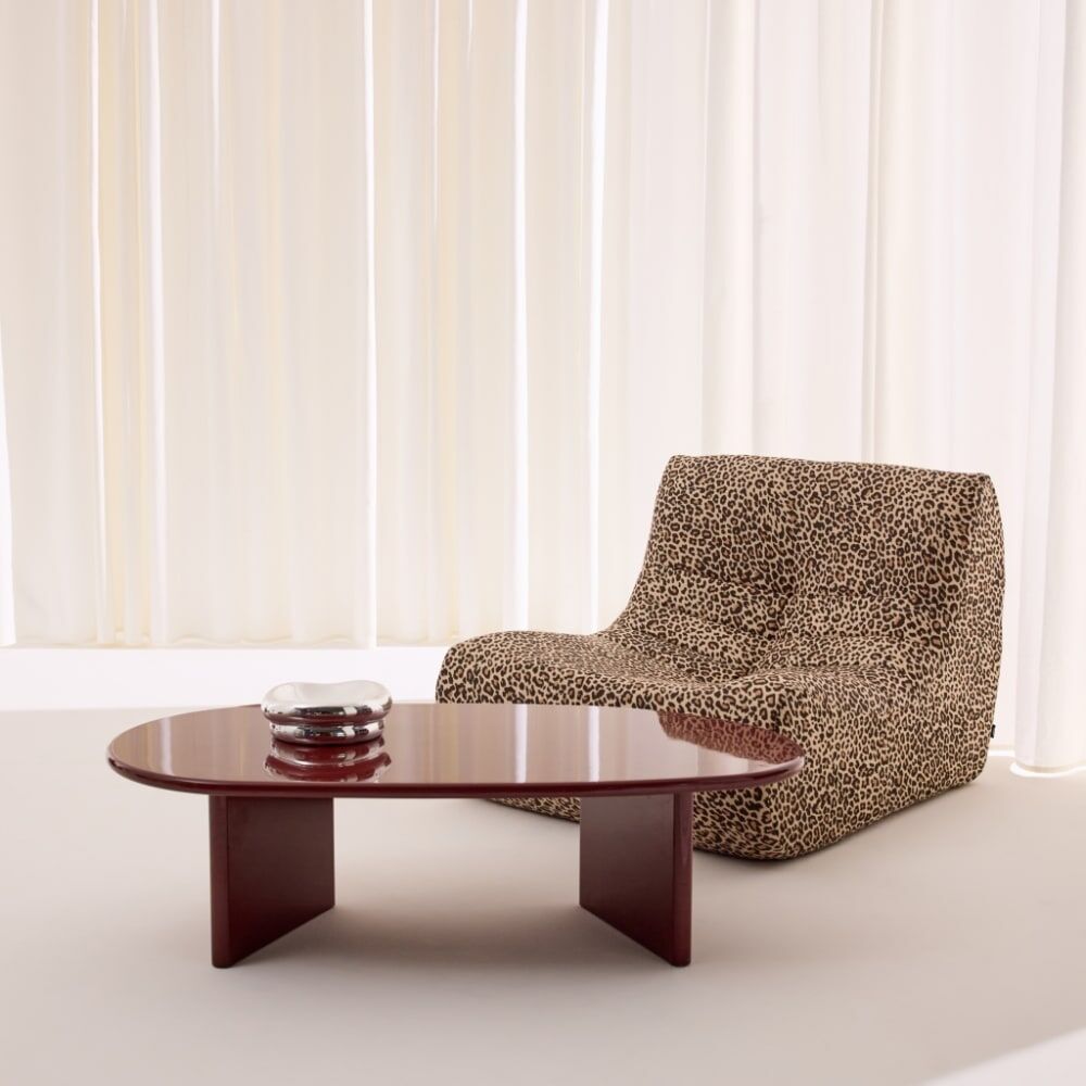 sweeek Table basse ovale finition glossy bordeaux Rouge 120x35x60cm