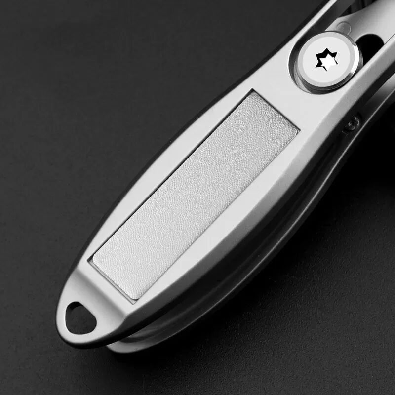 INF Coupe-ongles oblique autobloquant argent titane : Précision et sécurité pour des ongles impeccables