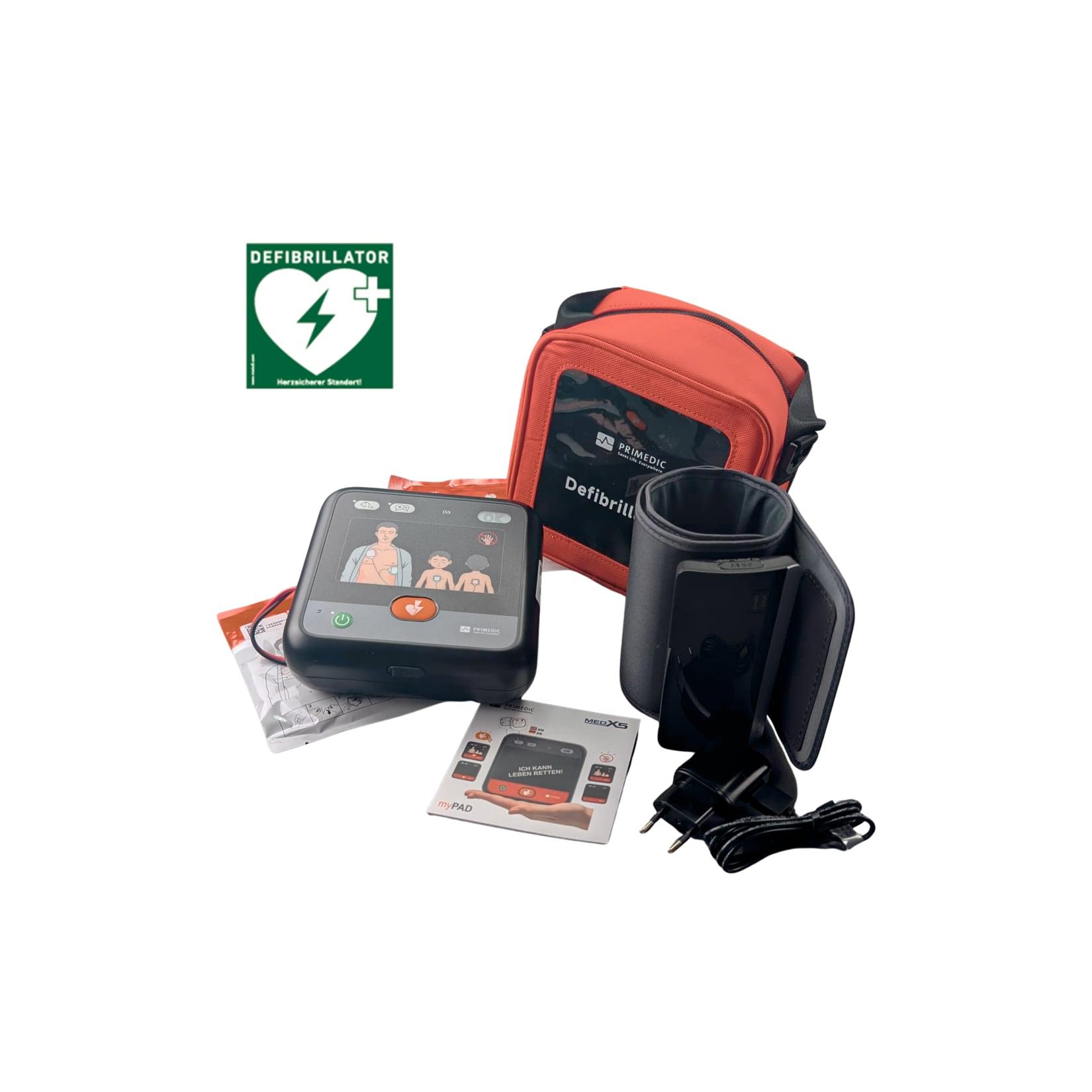 Metrax myPAD-M MedX5 Heimdefibrillator-Set für Senioren und Familien inkl. Bluetooth-Oberarm-Blutdruckmessgerät. Farbe: Schwarz/Grau, alternative Farbausführung je nach Verfügbarkeit möglich