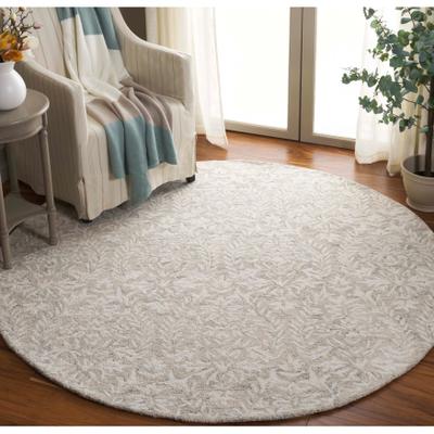 SAFAVIEH Hand-Tufted Ebony Melia Modern & Contemporary Wool Rug