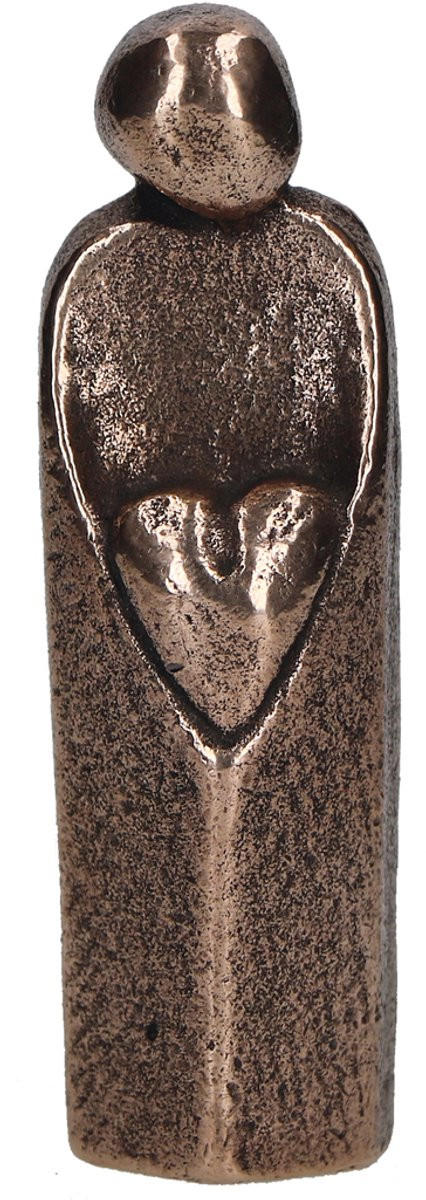 Abstract beeld van een persoon met hart in brons voor op tafel