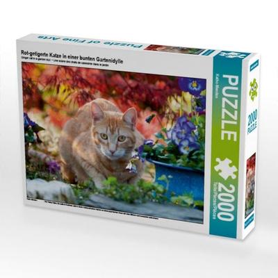 Rot-getigerte Katze in einer bunten Gartenidylle (Puzzle)
