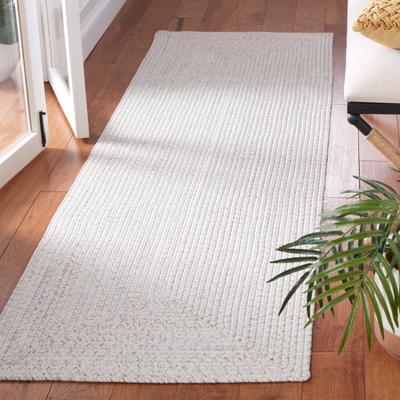 SAFAVIEH Handmade Braided Sakineh Casual Rug
