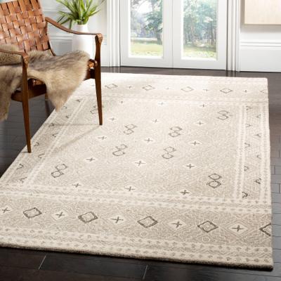 SAFAVIEH Handmade Micro-Loop Jelske Wool Rug