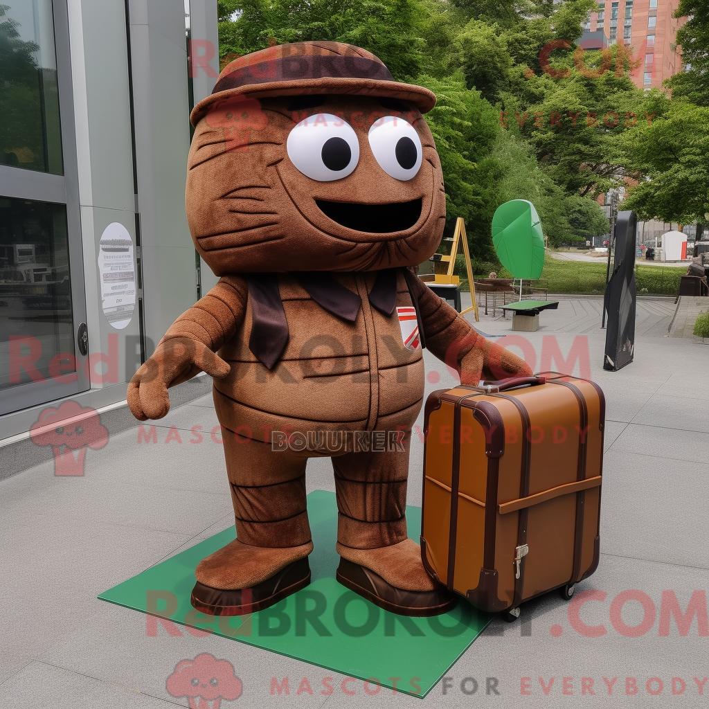Maskottchen-Charakter REDBROKOLY einer braunen Hochzeitstorte gekleidet in Cargohose und Aktentasche
