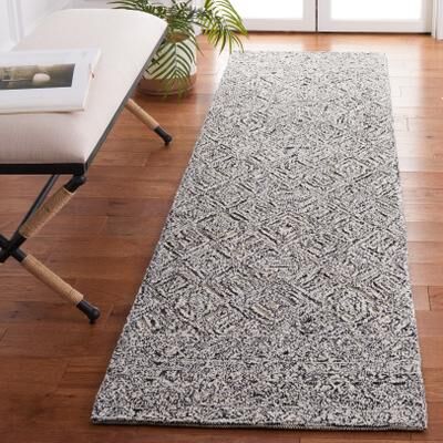 SAFAVIEH Handmade Textual Margund Wool Rug
