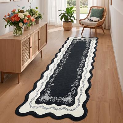 Garvee Surrounding Floral Border Scalloped Area Rug