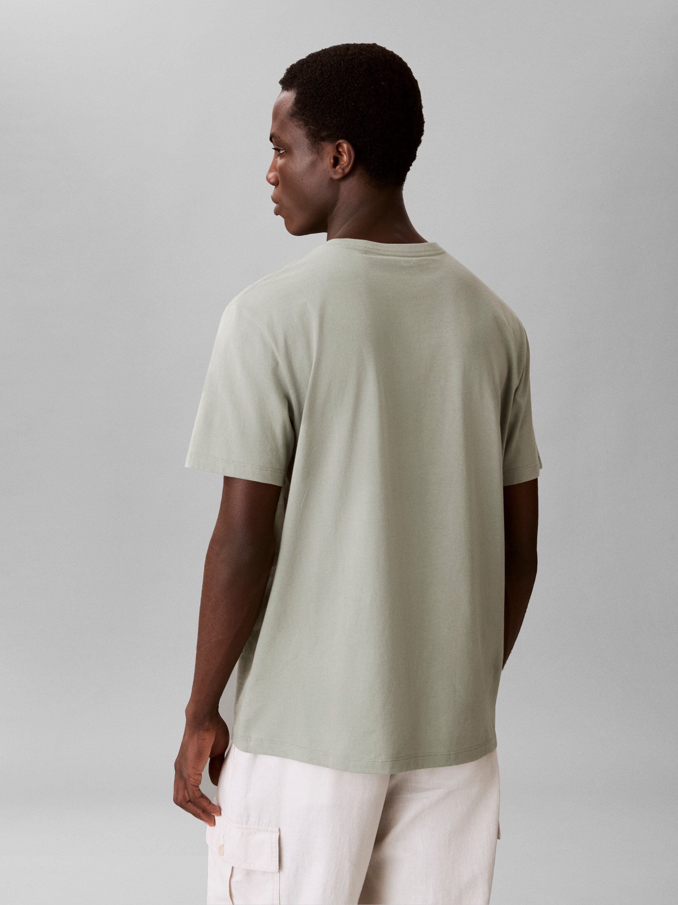 T-Shirt CALVIN KLEIN JEANS "30S EU WHOLESALE SPORTSWEAR GRAP", Herren, Gr. XL, grau (shadow), Web, Obermaterial: 100% Baumwolle, unifarben, klassisch normal, Rundhals, eingesetzt abgesteppte Kante, Shirts T-Shirt, Regular fit mit Rundhalsausschnitt shadow