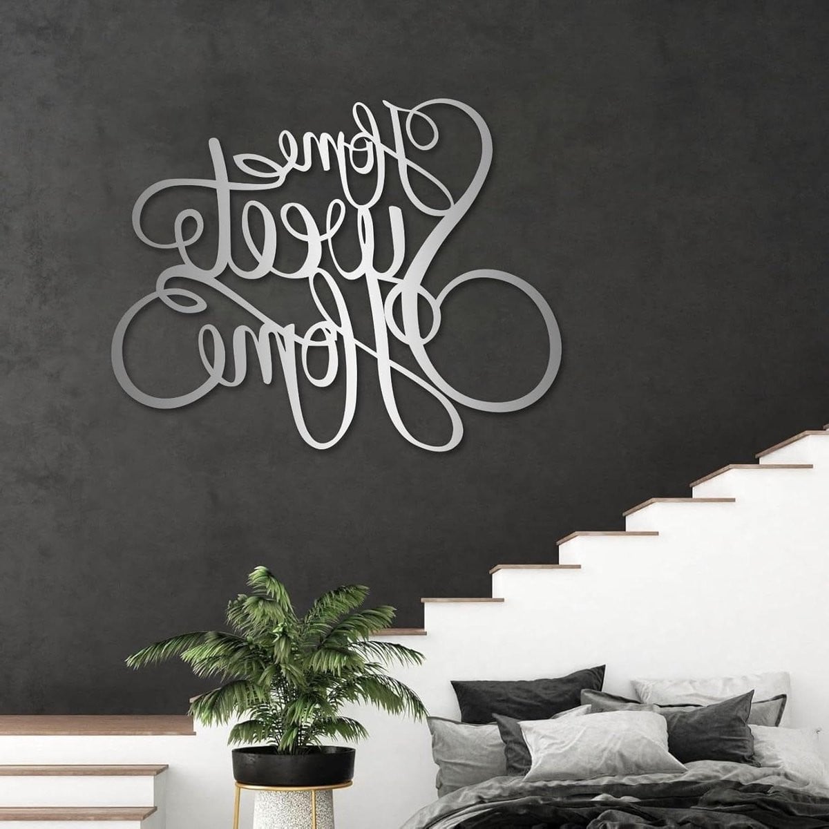 Zwarte metalen wanddecoratie met cursief lettertype tot 120 cm breed