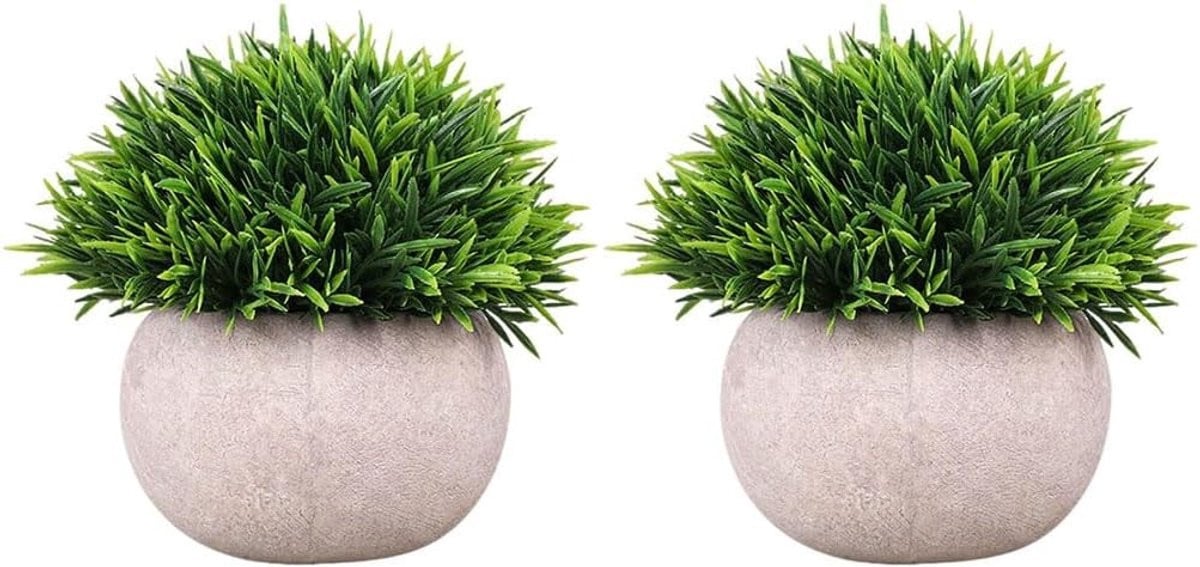 Merkloze groene kunstgras planten in schokbestendige natuurlijke potten voor decoratie