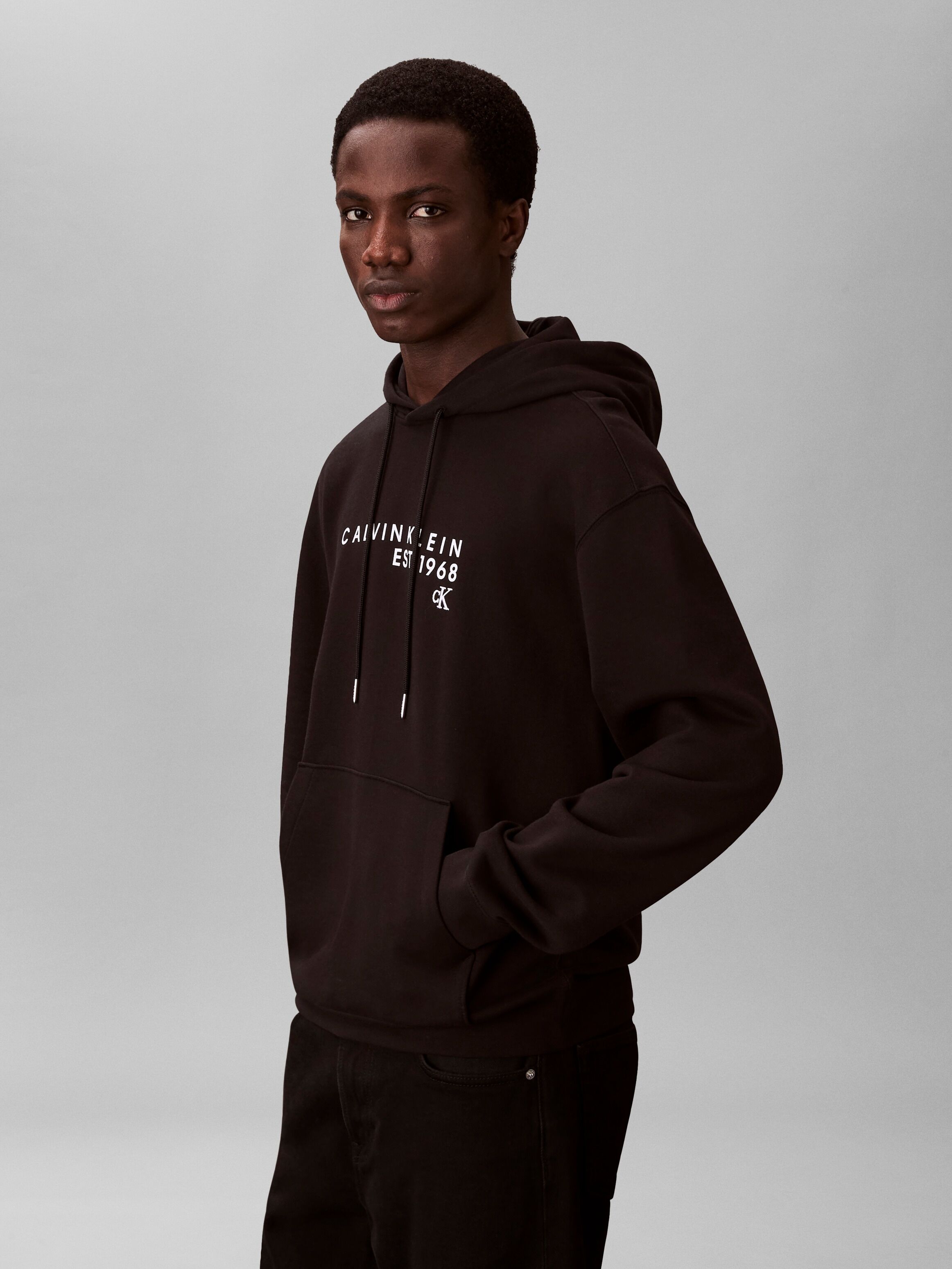 Kapuzensweatshirt CALVIN KLEIN JEANS "CALVIN 1968 GRAPHIC", Herren, Gr. S, schwarz, Sweatware, Obermaterial: 100% Baumwolle, unifarben, lässig geschnitten normal, Rundhals, eingesetzt Rippbündchen, Sweatshirts Kapuzensweatshirt, Regular fit mit Kapuze mit