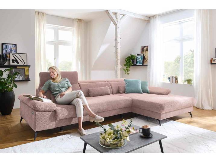 Ecksofa mit motorischen XL- Sitzvorzug in Stoff
