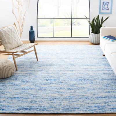 SAFAVIEH Handmade Himalaya Caitlyn Modern Wool Rug