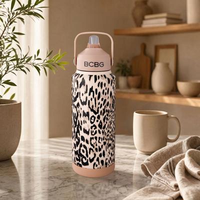 BCBG Signature Sip Hydration Stainless Steel Tumbler with Flip Top Lid and Silicone Boot - 32 oz