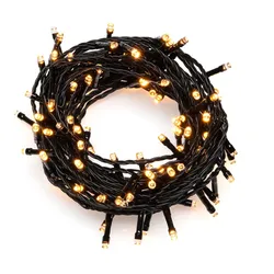 Konstsmide LED Lichterkette, mit Glimmereffekt, 160 bernsteinfarbene Dioden (80 glimmend), 24V, Außen (IP44), schwarzes Kabel - 3641-810