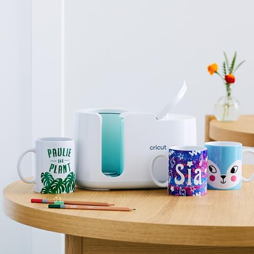 Cricut Mug Press Startpakket in zwart en wit met plastic onderdelen