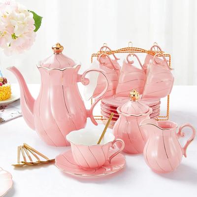 KitchenNation 22 Piece Porcelain Tea Set For 6 Luxury British Style Tea & Coffee Cups With Golden Trim princess Pink