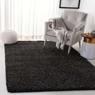 SAFAVIEH Evolution Shag Gwenaele Solid 1.8-inch Thick Rug