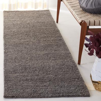 SAFAVIEH Handmade Himalaya Modern & Contemporary Solid Ivory Wool Rug