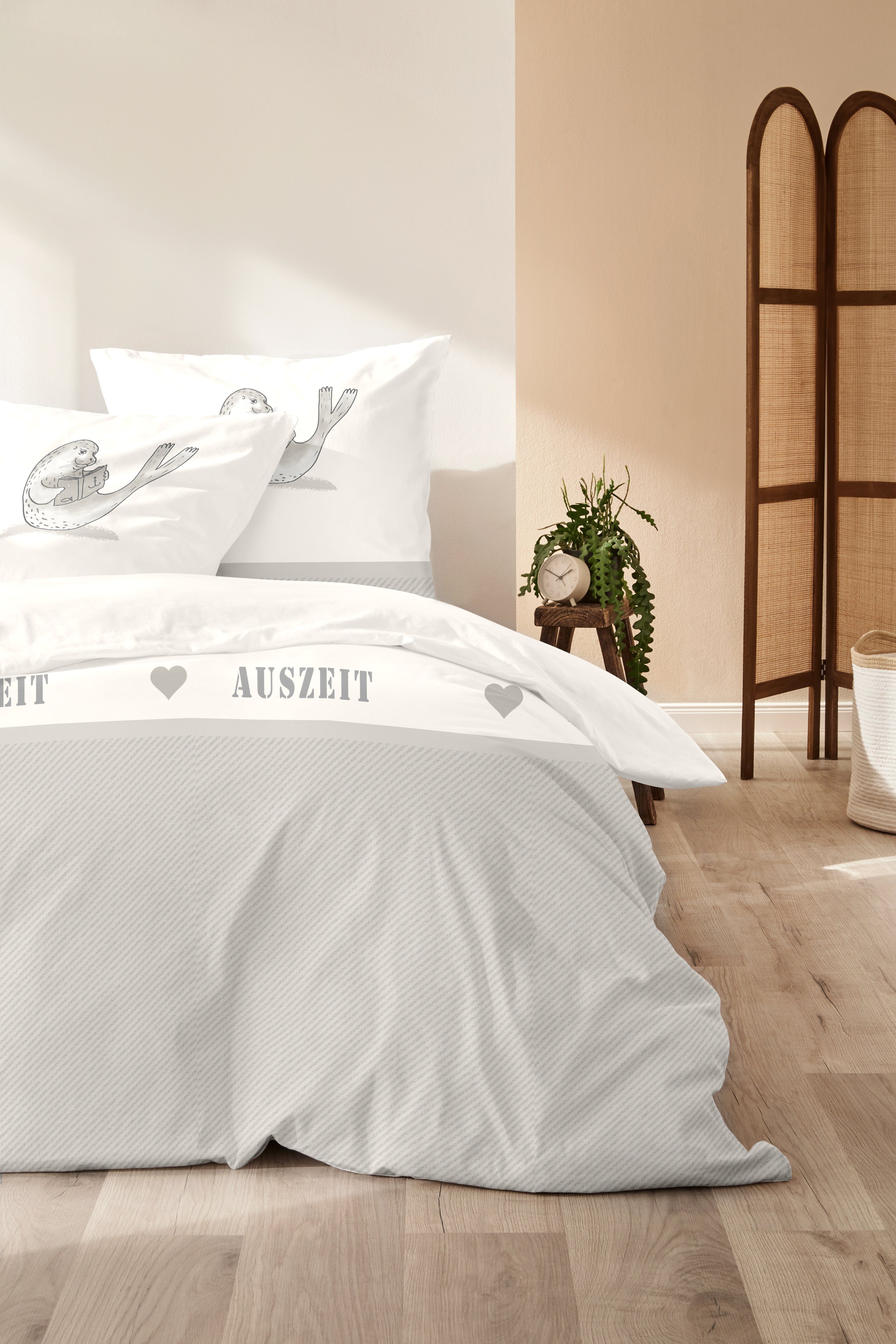 Bettwäsche PRIMERA "Renforce-Bettwäsche Auszeit", beige (natur), B/L: 155cm x 220cm, 1 Stk., 1 Stk., Renforcé, B/L: 80cm x 80cm, 2 Stk., Renforcé, Obermaterial: 100% Baumwolle, Bettwäsche, Bettwäsche, mit relaxender Robbe natur B/L: 155cm x 220cm, 1 Stk.,