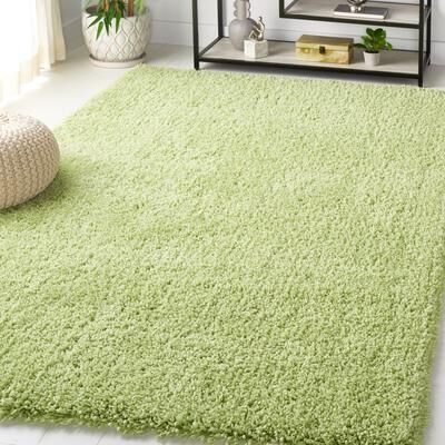 SAFAVIEH Handmade Classic Shag Nakhshun Rug