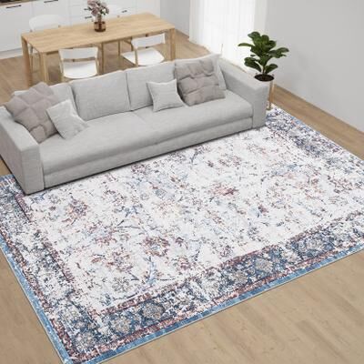 Garvee Faded Distressed Medallion Area Rug