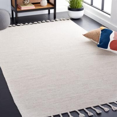 SAFAVIEH Handmade Dhurries Ursina Wool Tassel Rug