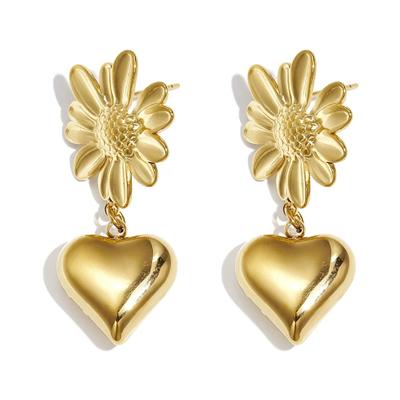 Paar Ohrhänger ADELIA´S "LIVAYA", Damen, Gr. Damen, Edelstahl, gold (goldfarben), Ohrringe, Stylisch wirken die hängenden Herzanhänger unter den Blumenmotiven.