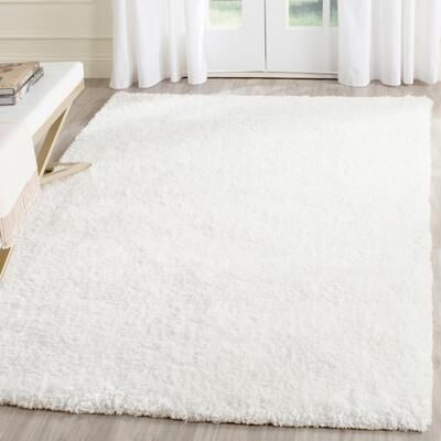 SAFAVIEH Handmade Toronto Shag Devon Polyester Rug