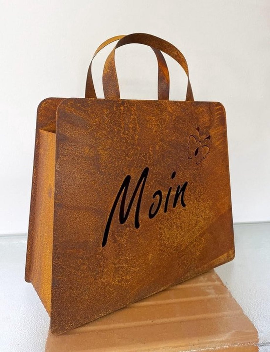 Grote decoratieve metalen handtas met vlinder voor in de tuin