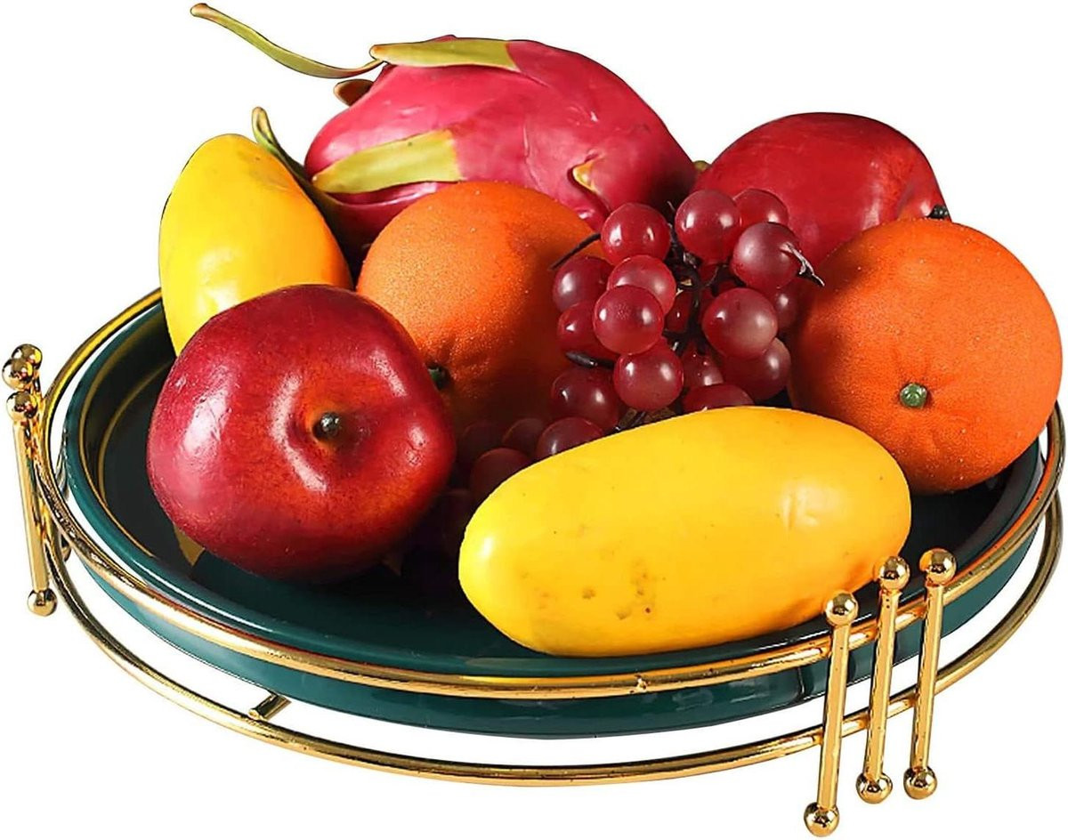 Gouden metalen fruitmand met keramische kom voor op je aanrecht
