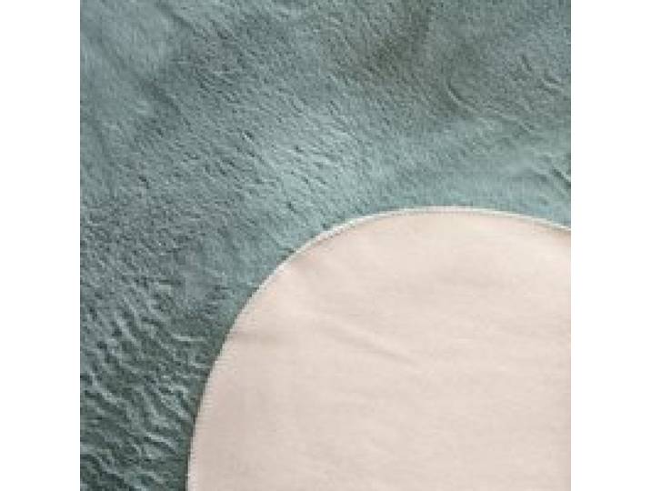 Tapis en fourrure Pelsa turquoise 120x160 cm forme de peau