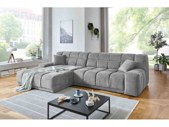 Ecksofa inkl. motorischen XXL- Sitzvorzug in Stoff