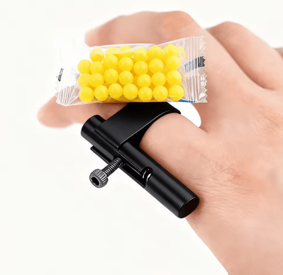 Inspire Curations Hidden Mini Paper Ball Launcher Mini Paper Ball Launcher Fun Prank Toy Gadget For Parties & Desk Games black