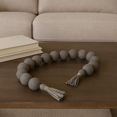 Sagebrook Home "Ecomix Bead Strand with Leather Tassels and Chiseled Texture Detailing - 53"" x 3"" x 3"""