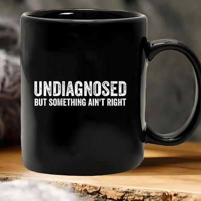 Lustige Geschenktasse mit Aufschrift „Unbekannt, aber irgendetwas stimmt nicht" – schwarze Keramik-Kaffeetasse, humorvoller Becher für Freunde, Kollegen, Büro oder Zuhause