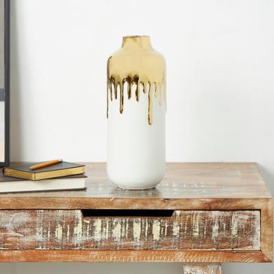 CosmoLiving by Cosmopolitan Black or White Ceramic Vase with Abstract Gold Melting Drips