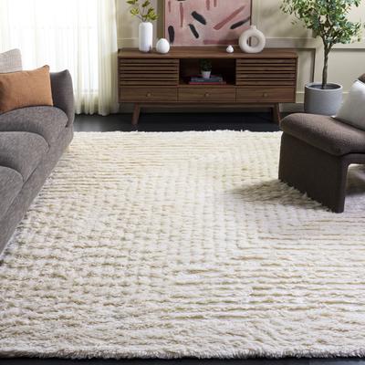 SAFAVIEH Handmade Casablanca Zhivka Shag Wool Rug