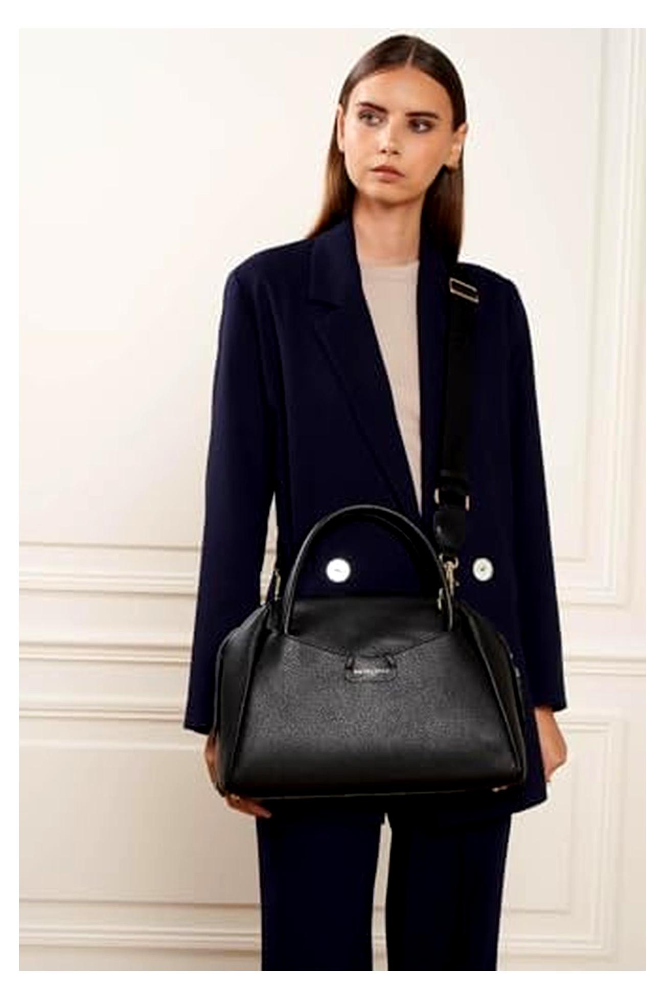 Schlichte, elegante Handtasche Dune in Schwarz mit goldfarbenen Akzenten und verstärkten Henkeln