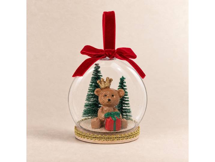 Weihnachtsschmuck, durchsichtige Glocke, bunter Teddybär und rote Schleife