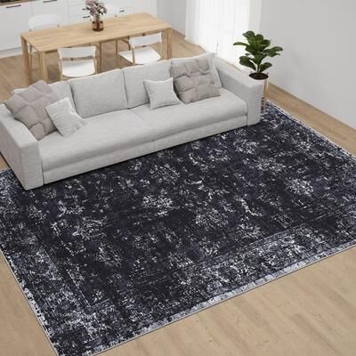 Garvee Faded Distressed Medallion Area Rug