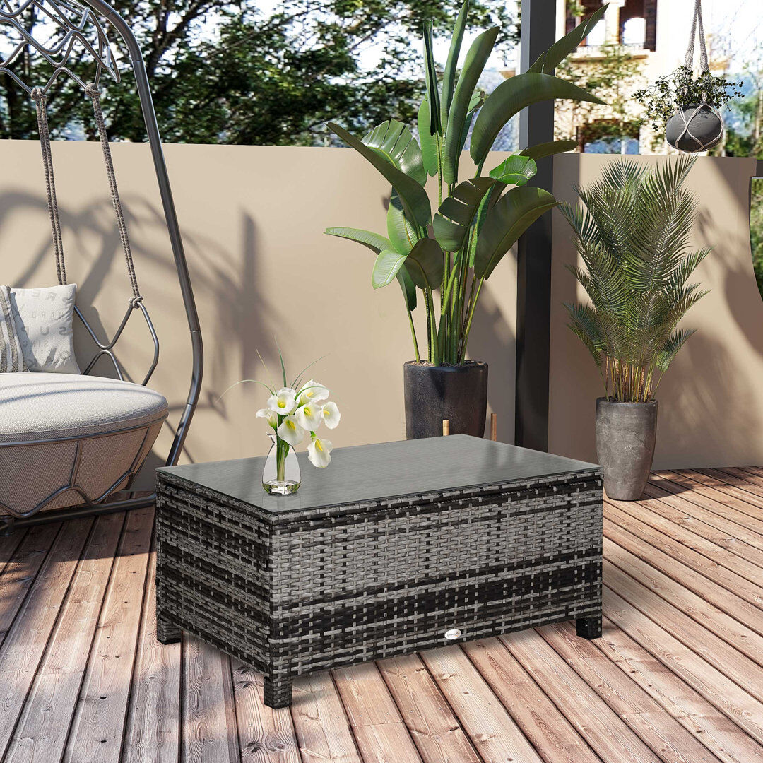 Mistana Sirard PE Rattan Outdoor Coffee Table w/ Tempered Glass Top, Mixed Grey Clear