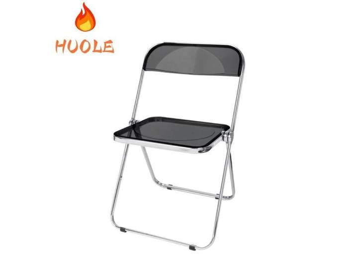 Chaise pliante en acrylique noire empilable et élégante sans accoudoirs pour la salle à manger ou le salon.