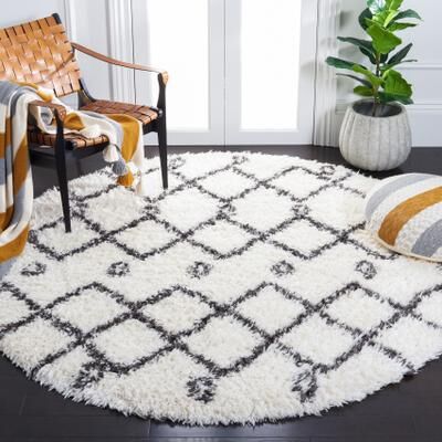 SAFAVIEH Handmade Flokati Melony Shag Solid Polyester Rug