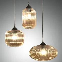 3-flammige Nordal Pendelleuchte Stilmix unterschiedliche Schirmgrößen geriffelt  in Amber von Fabas Luce