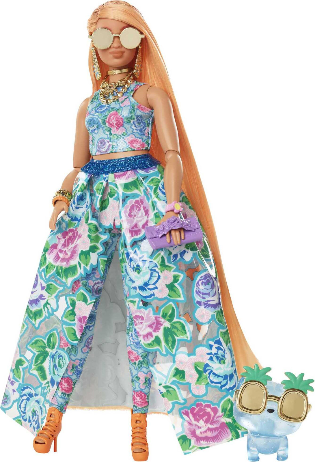 Barbie Extra pop in een blauwe jurk met bloemenprint