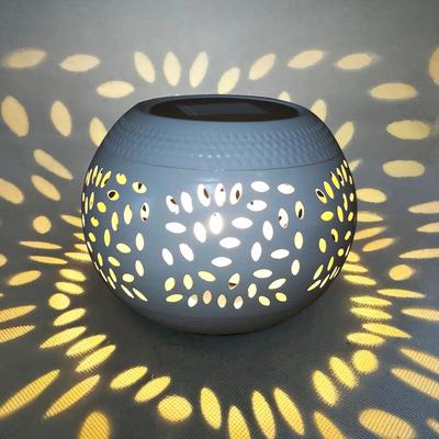 Uplifted Goods Solar Powered Outdoor Lantern Garden Light white spotted