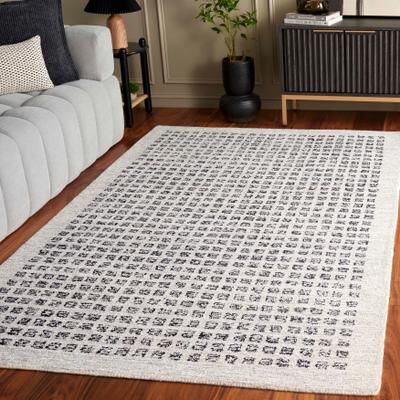 SAFAVIEH Handmade Ebony Uschi Modern Rug